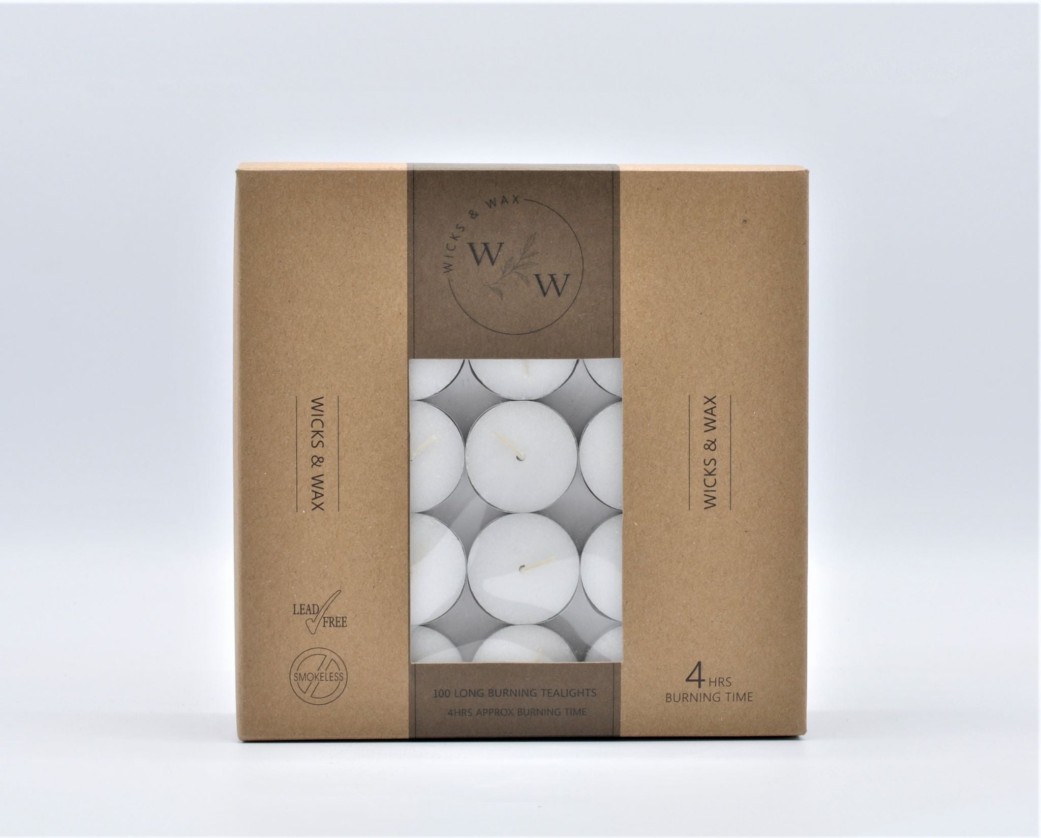 brown cardboard box packaging; clear plastic window showing white tealights; white wax candles; each tealight in silver metal cup; text on box states 4 hour burn time;