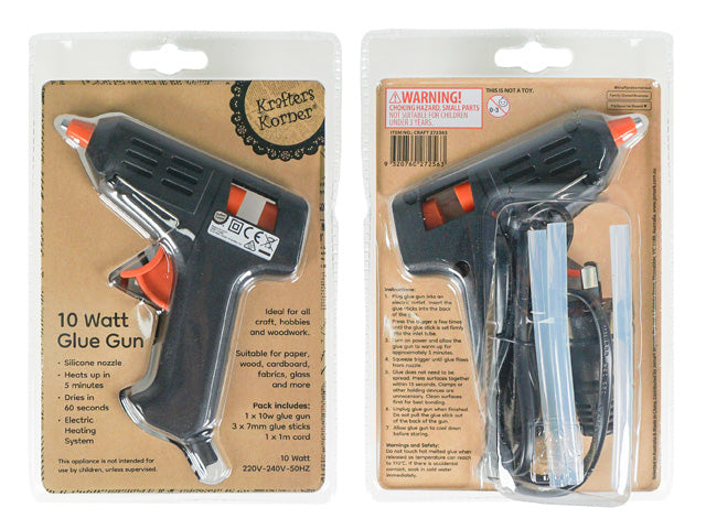 black glue gun with orange trigger; silicone nozzle; includes 3 glue sticks; transparent packaging with cardboard backing;