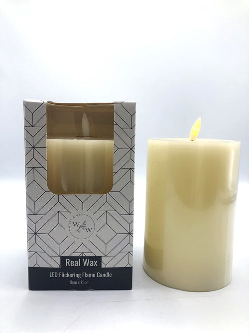 Cream coloured pillar candle; Real wax material; Flickering LED flame; Packaging with geometric pattern; Dimensions 10cm x 15cm indicated on box;