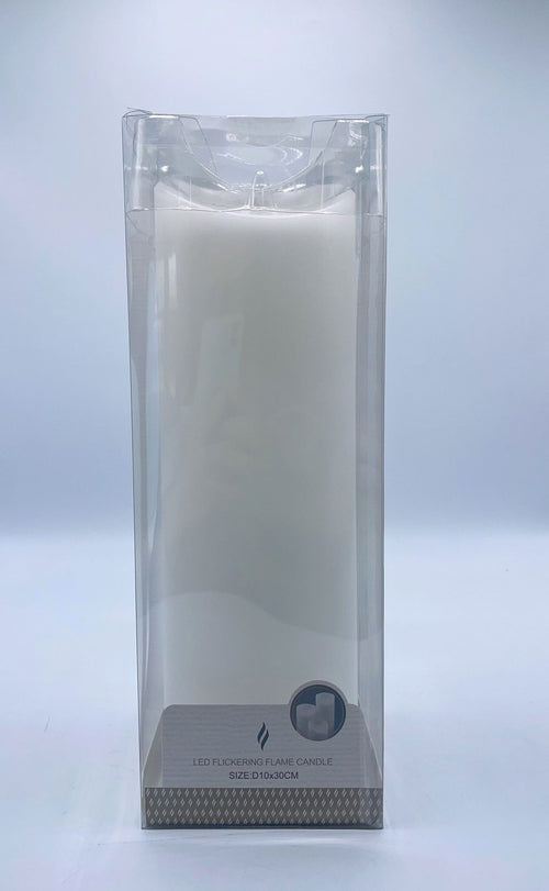 white pillar candle; plastic transparent packaging; cylindrical shape; label with size and flame icon;
