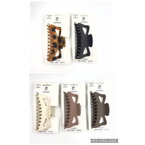 Large 13cm claw clip with interlocking teeth; Matte solid colours including neutral tones; Packaged on white branded backing card; Curved shape with cut-out side sections;