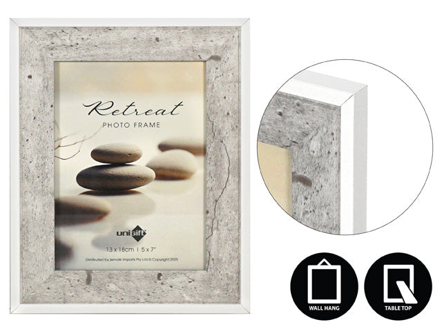 stone-effect textured border; white outer edge trim; rectangular shape; fits 13x18cm photos; suitable for wall hanging and tabletop display;