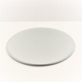 round shape; clear reflective surface; 15cm diameter; flat profile; thin edges;