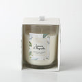 White wax candle in clear glass jar; Label with floral design and gold trim; Packaged in white box with floral accents; Single wick candle;