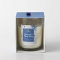 Clear glass jar candle; Cream-coloured wax; Blue and white floral label; Blue and white box packaging; 180g size;