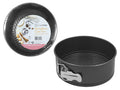 black round cake pan; non-stick textured base; metal latch on side; smooth inner surface; packaged with label featuring baking imagery;