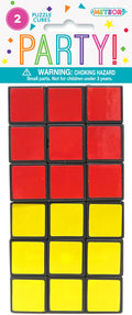 Two plastic puzzle cubes; Red and yellow coloured squares; Black cube frames; Packaged on blister card; Bright, colourful party style packaging;