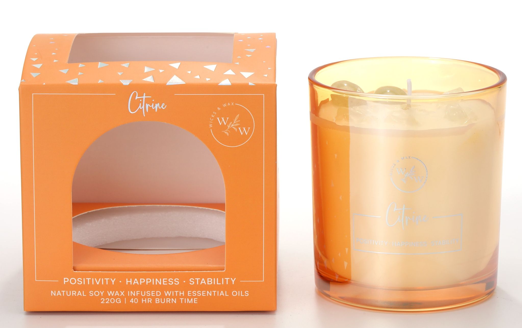 Orange tinted glass jar; Citrine crystal pieces embedded in wax; Orange decorative box with cut-out window; White soy wax; Silver print text on jar and box;