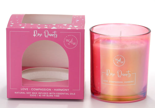 Pink iridescent glass holder; Candle infused with rose quartz crystals; Pink packaging box with window; Labelled with 'Rose Quartz' and scent details;