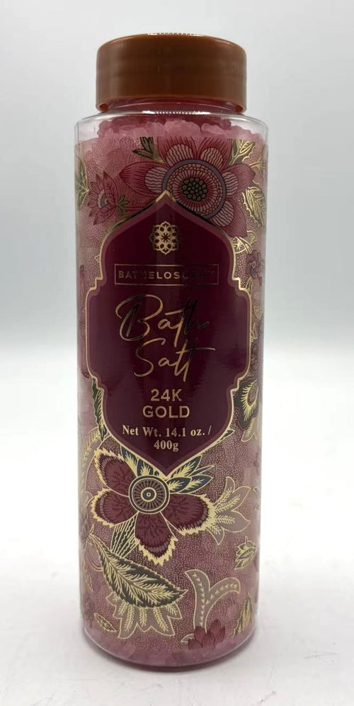 clear plastic bottle; brown screw cap; pink bath salts visible; floral gold and maroon label design; 400g net weight indicated;