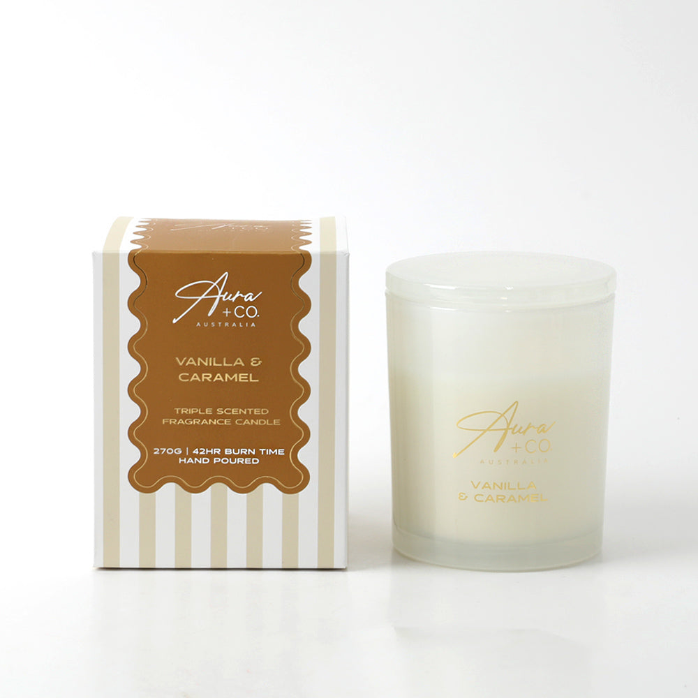 Frosted glass jar with matching lid; Gold print label on jar; Box with white and beige stripes; Brown label on box with product details;