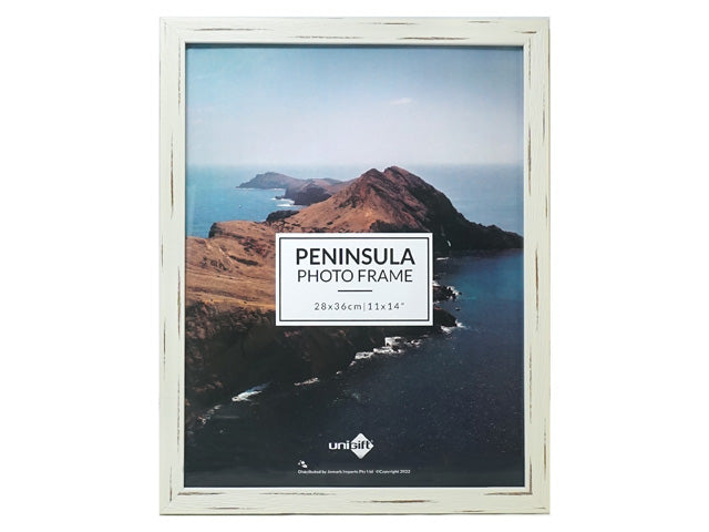 whitewashed wooden frame; rectangular shape; 28x36cm size; displaying coastal photo artwork;
