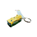 3D resin tram shape; yellow and green colour; metal ring attached; small compact size;