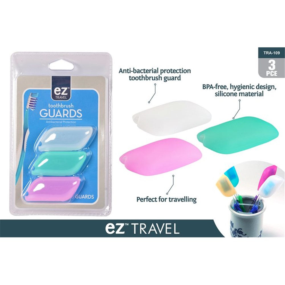 Set of 3 silicone toothbrush covers; Colours: white, green, pink; Silicone material with smooth finish; Packaged in clear plastic with blue backing; Product name 'toothbrush GUARDS' visible;