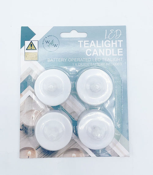 4 pack of white LED tealight candles; packaging includes blue and beige tones; battery operated with battery included; round shape with domed top;