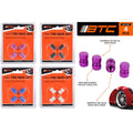 4 metal tyre valve caps per pack; packs in purple, black, blue, and silver colours; caps shaped cylindrical with knurled grip; packaging on orange and black backing card;