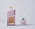 Clear glass bottle with silver metal collar; White reed sticks inside diffuser; Rectangular box with lavender and white colour gradient; Box labelled 'Tasmanian Lavender' and 'Premium Reed Diffuser'; 50ml volume indicated on box and bottle;