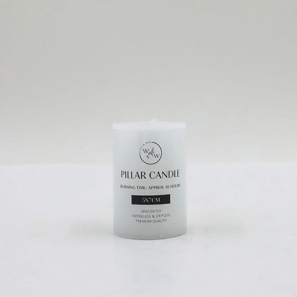 white cylindrical pillar candle; flat top surface; black text printed on candle; label states 5x7cm size; smooth wax finish;