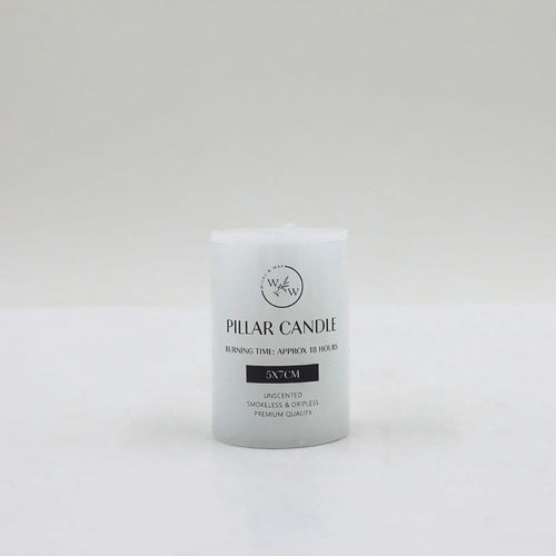 white cylindrical pillar candle; flat top surface; black text printed on candle; label states 5x7cm size; smooth wax finish;