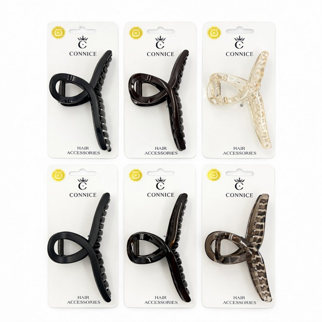 Hair claw clip with twist cross shape; Approx. 6cm length; Made from glossy plastic material; Shown in assorted neutral and tortoiseshell-style colours; Packaged on white backing card branded “Connice”;