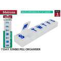 Clear plastic material; Seven separate compartments; Days of the week labelled with large blue letters; Rectangular shape; Packaging with Matrons brand;