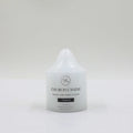white candle; church candle shape; cylindrical with tapered top; printed text on candle body;