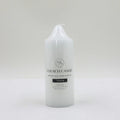 White colour; Cylindrical shape; Plastic or wax material; Text printed on front; Pointed top;