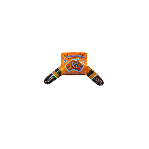 8-inch plywood boomerang; hand-painted Aboriginal style design; orange and black colours; traditional boomerang shape;