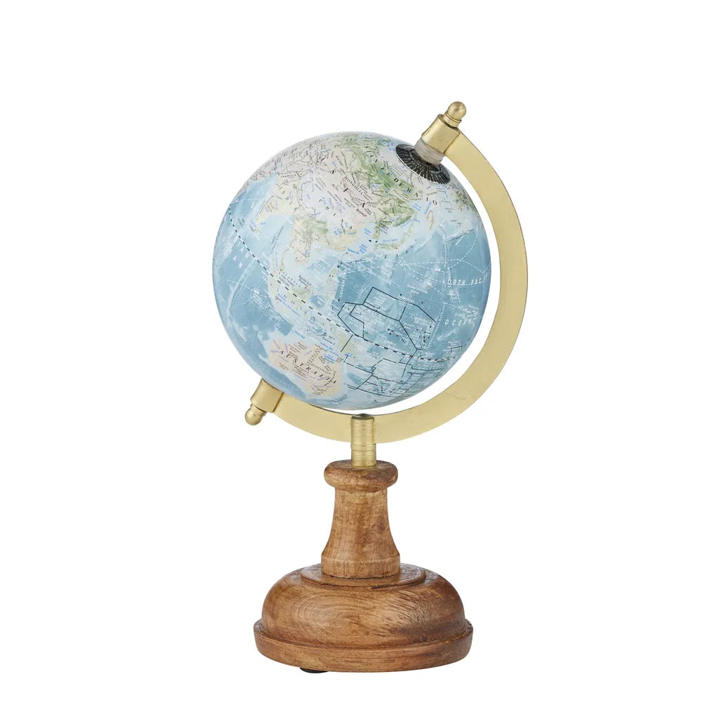 blue coloured globe surface; natural wood shaped circular base; brass-coloured metal stand; globe mounted to rotate within stand;