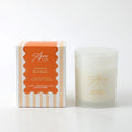 270g candle in frosted glass jar; gold foil Aura+Co logo; orange and cream striped packaging; glass lid on candle;