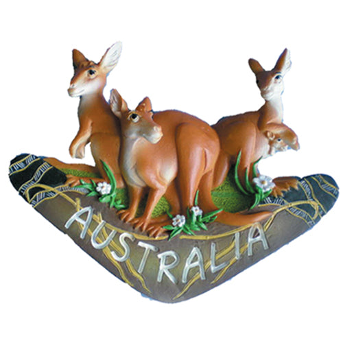 depicts three kangaroos in brown and tan; green grass and small white flowers detail; word 'AUSTRALIA' in raised white letters; resin material with hand-painted finish; natural earthy colour palette;