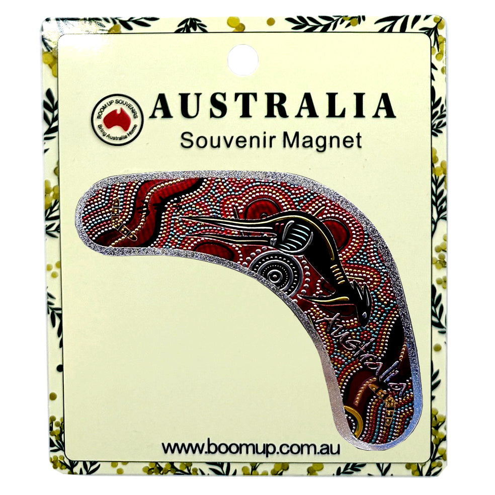 boomerang shape; PVC material; colourful Aboriginal dot art design; packaged on cream card with floral border; Australia souvenir labelled;