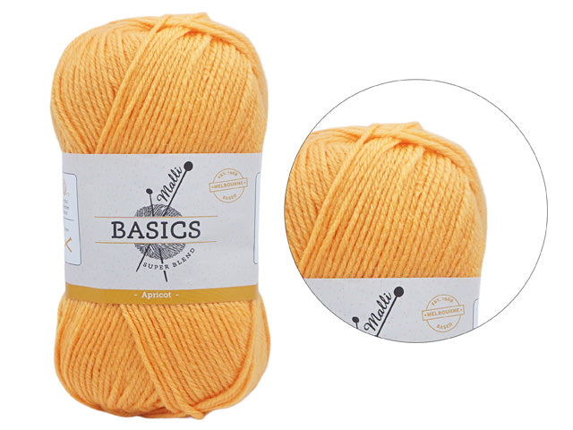 Apricot colour yarn; Twisted yarn texture; Paper label with BASICS branding; Compact skein shape;