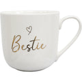 White bone china mug; Gold foil 'Bestie' text; Gold accent handle; Rounded shape; Smooth glossy finish;
