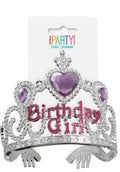 silver plastic frame; purple heart and teardrop-shaped jewels; pink glittery 'Birthday Girl' text; attached combs for secure wear;