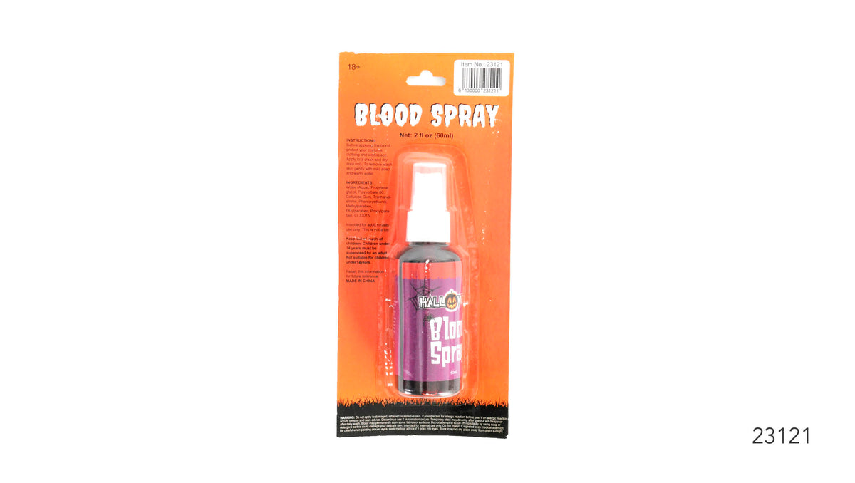 Orange blister-card packaging; Purple bottle label with Halloween graphics; Dark-coloured bottle; White spray pump;