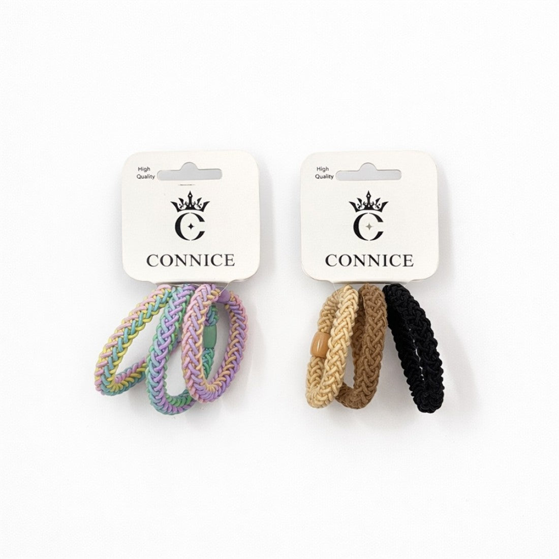 Braided elastic hair ties in looped bands; One set in pastel rainbow tones with purple and green; One set in beige, tan and black colours; Mounted on white CONNICE branded cards;