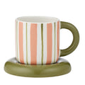 ceramic cup with vertical pink and olive stripes; olive green handle; matching olive green saucer; cup dimensions approximately 13x10cm;