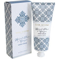 Tube with blue and white floral pattern; Gold foil text on packaging; 100ml tube size; Box and tube both feature decorative pattern; White plastic cap on tube;