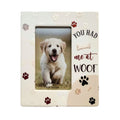 white ceramic frame; multicoloured paw prints in red, brown, black, beige; text saying 'You had me at Woof'; bone illustration; holds 4x6 inch photo;