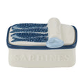 white ceramic box with blue trim; lid shaped like sardine tin with blue sardines; embossed 'SARDINES' text on side; lid features a light blue pull-tab;