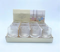 clear ribbed glass material; cylindrical shape; size approximately 6.5cm diameter by 8cm height; designed for taper or tealight candles;