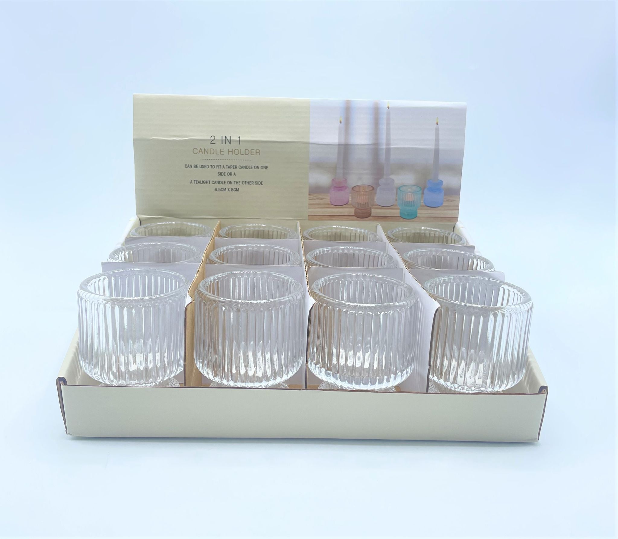 clear ribbed glass material; cylindrical shape; size approximately 6.5cm diameter by 8cm height; designed for taper or tealight candles;