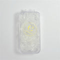 Clear mini hair elastics; Rectangular transparent plastic case; Yellow circular logo print on case; Compact, pocket-sized packaging;