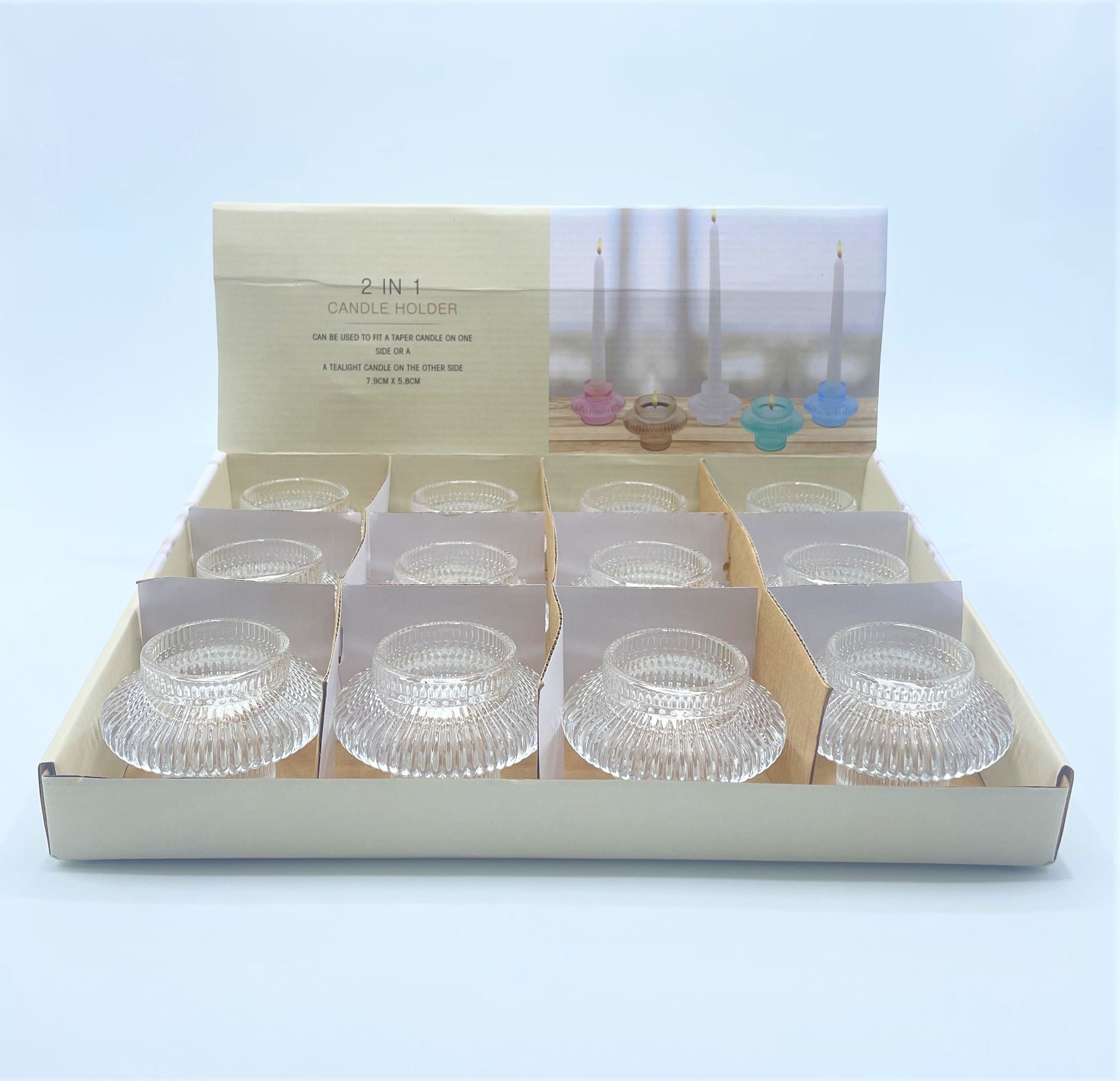clear ribbed glass material; two-use design for taper and tealight candles; compact size 7.9cm diameter and 5.8cm height; packaged in cardboard box with divider;