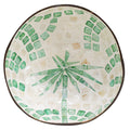 round bowl shape; deep green palm design; cream mosaic background; handcrafted coconut and capiz material;