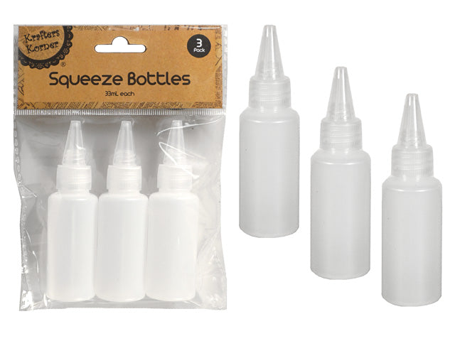 clear semi-opaque plastic bottles; pointed nozzle cap; set of three bottles; packaged in clear plastic with cardboard header;