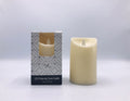 Cream colour; Plastic material; Flickering flame shape; Packaged in white and grey box; Dimensions approx. 7.5x12.5cm;
