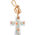 white ceramic cross shape; orange, green and blue floral patterns; light natural wood beads necklace; compact size and flat design;