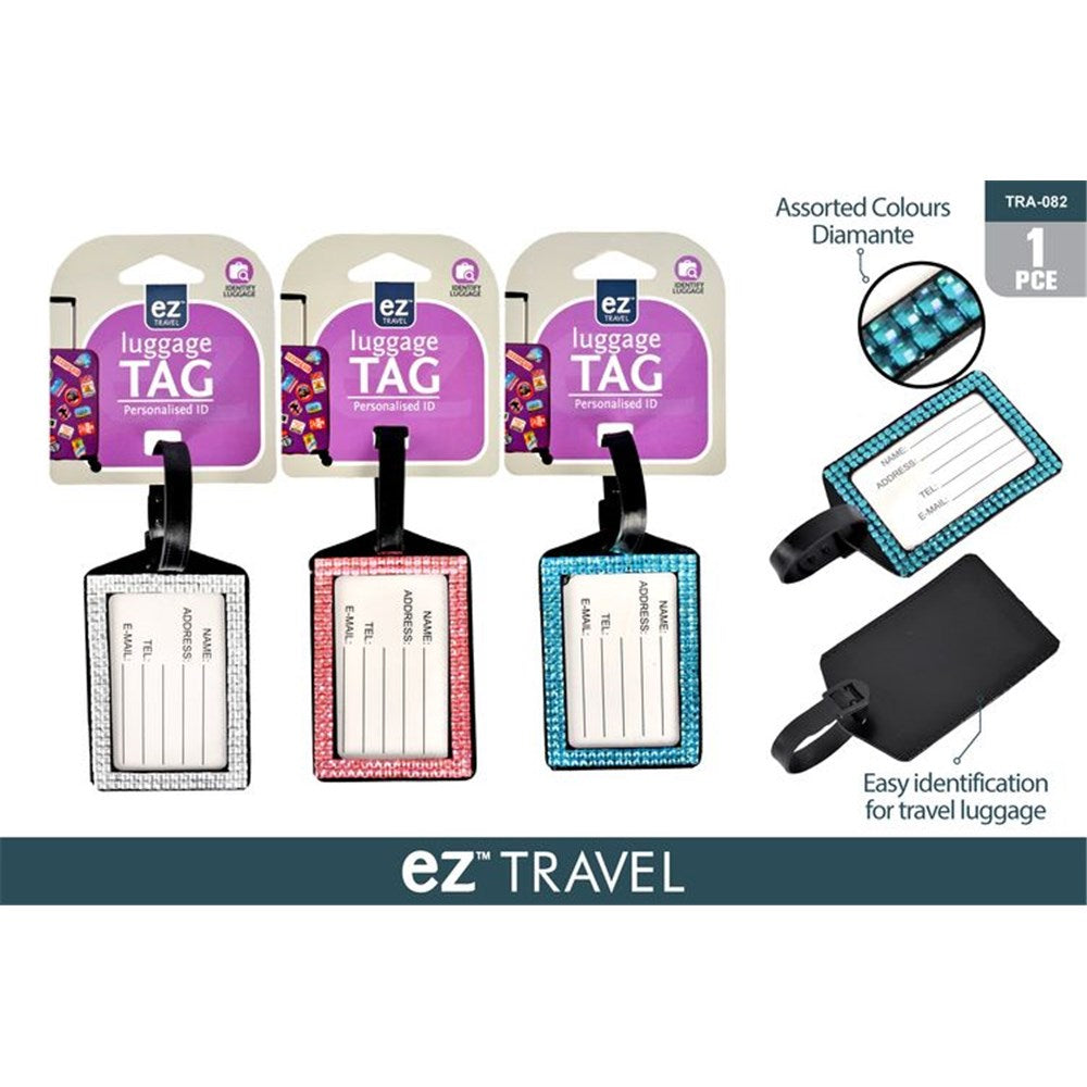 Rectangular luggage tag with clear ID window; Diamante crystal decorated border in assorted colours; Black flexible attachment strap; Shows example colours: white, pink, blue;